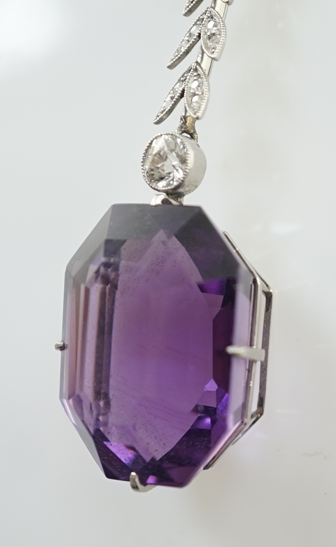 A 1920's white gold, amethyst, diamond and cultured pearl set drop pendant necklace